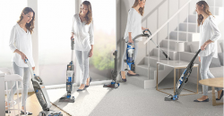 Woman using a cordless vacuum cleaner to clean throughout the home